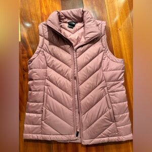 North face woman’s blush colored puff vest